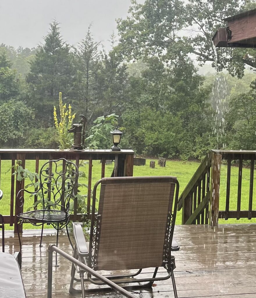 Rainy Day Peaceful Deck Forest Retreat Rainy deck overlooking a lush Missouri forest at the peaceful retreat.